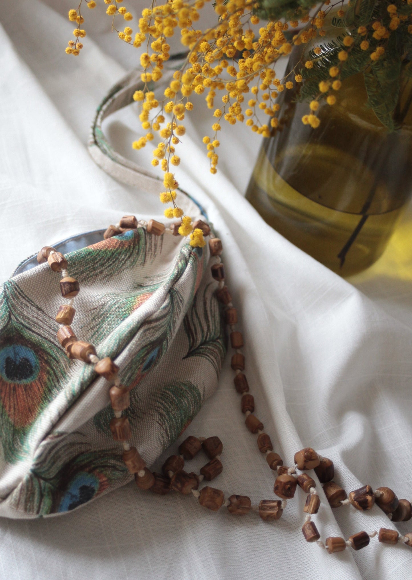 Maišelis maldos karoliukams su plunksna lininis